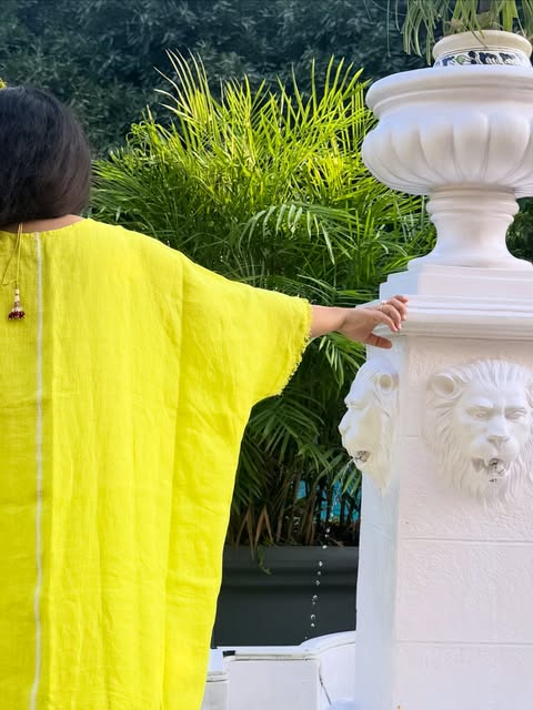 Yellow linen by the fountain