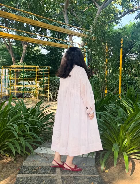 White linen dress in the garden